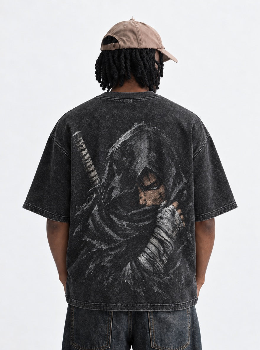 Hooded Guts – T-Shirt – model shot | Berserk