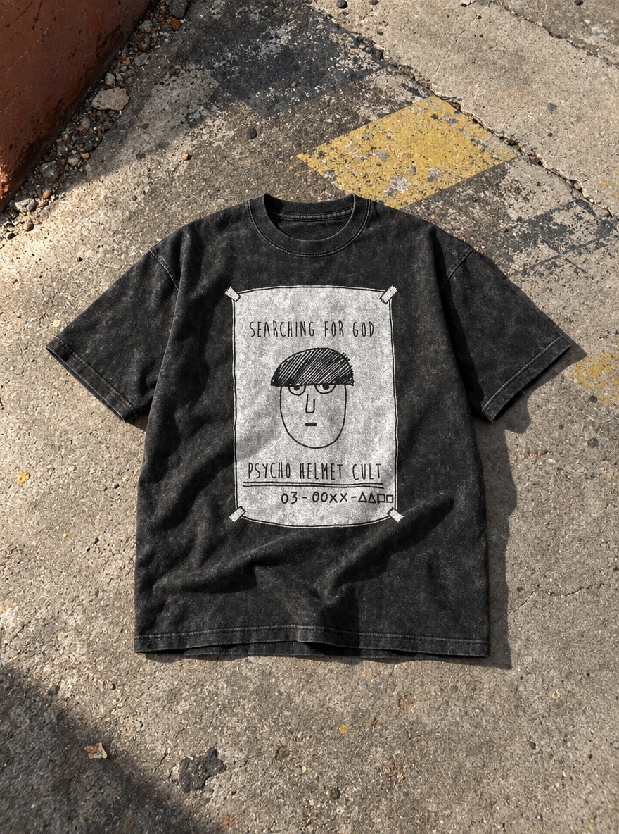 Psycho Helmet Cult – Black Acid Wash Tee – flat-lay | Meme Tees