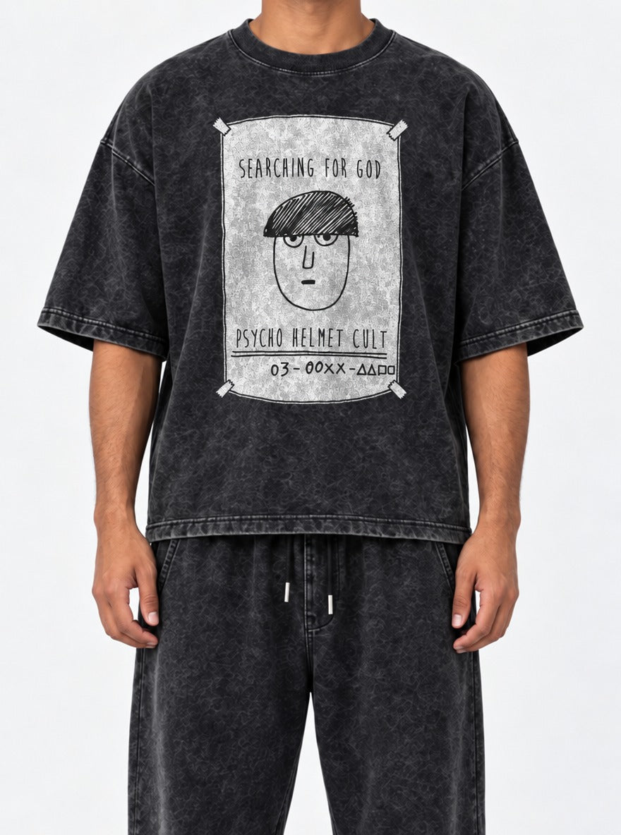 Psycho Helmet Cult – Black Acid Wash Tee – model shot | Meme Tees