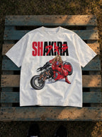 Shakira – White Tee – flat-lay | Meme Tees